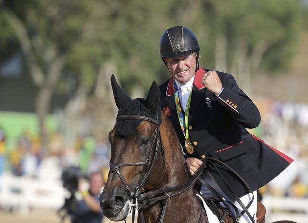 Tony Gentile  Reuters
Nick Skelton 58 celebrates his gold medal