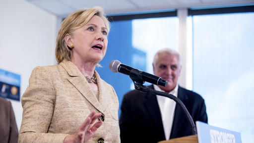 Democratic presidential candidate Hillary Clinton speaks to medical professionals after taking a tour of Borinquen Health Care Center in Miami Fla. Tuesday Aug. 9 2016 to see how they are combatting Zika