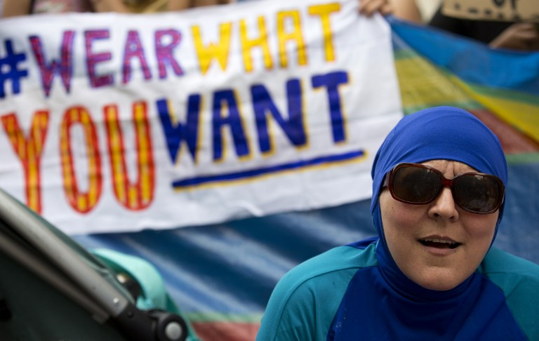 Women protest French burkini ban with London beach party demo