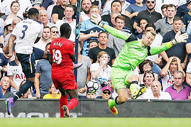 Tottenham’s Danny Rose scores the equalising goal against Liverpool’s Simon Mignolet- AP