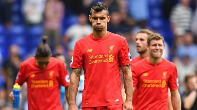 Liverpool’s Dejan Lovren leaves the field after the game against Tottenham