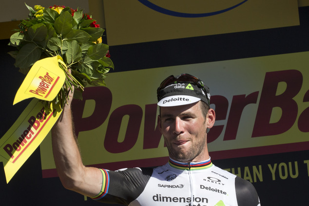 Stage winner Britain's Mark Cavendish celebrates on the podium after the fourteenth stage of the Tour de France cycling race over 208.5 kilometers (129.2 mil