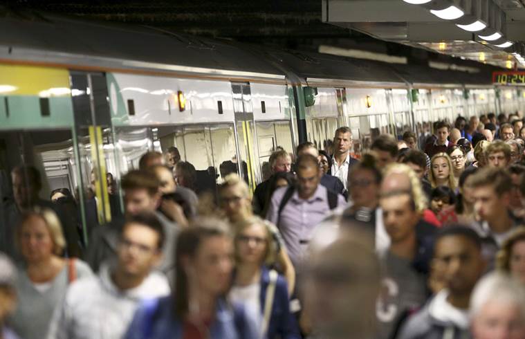 Passengers disembark a Southern train at Victoria Station in London Britain