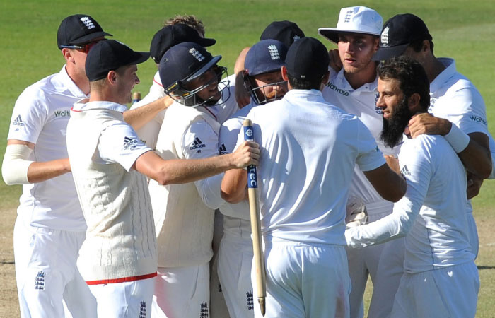 England team celebrates after Moeen Ali caught and bowled Pakistan’s Sohail Khan for England to beat Pakistan by 141 runs at Edgbaston in Birmingham Sunday. — AP