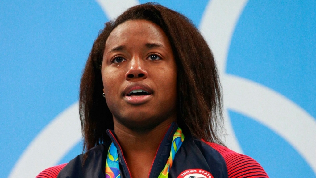 Manuel becomes first African American woman to win swim gold