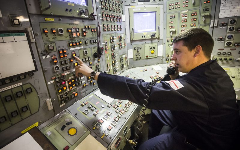 An engineering technician in the control room on board Vanguard-class submarine HMS Vigilant one of the UK's four nuclear warhead-carrying submarines