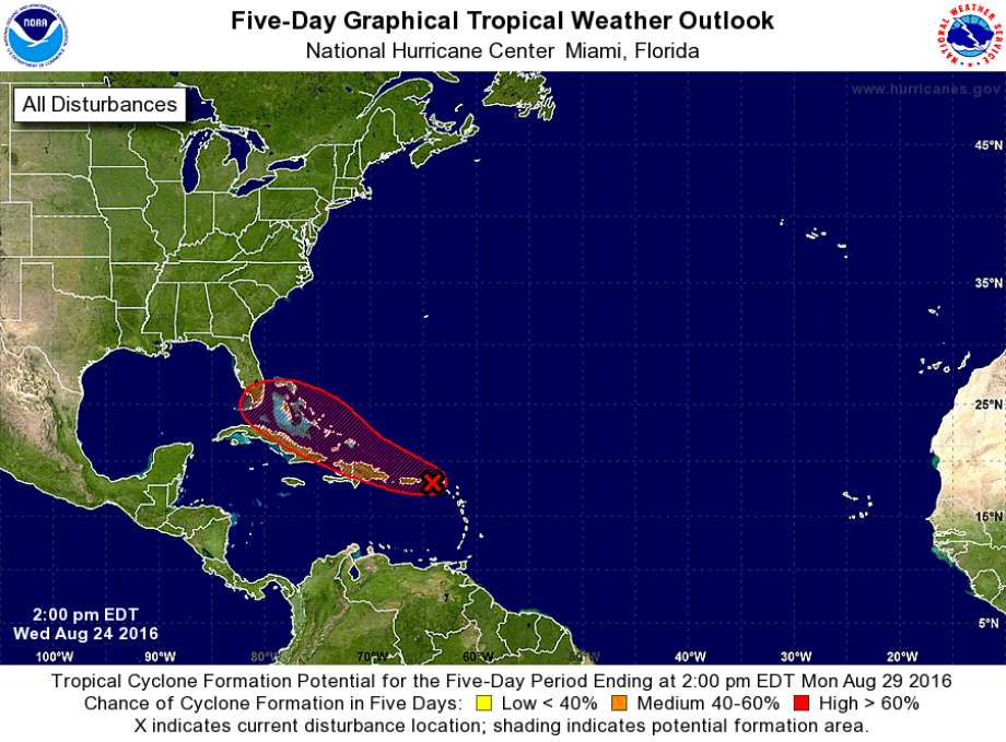 A still unorganized area of low pressure in a strong tropical wave between the northern Leeward Islands and Puerto Rico could develop quickly into a tropical depression or tropical storm in the next couple of days the National Weather Service is reportin