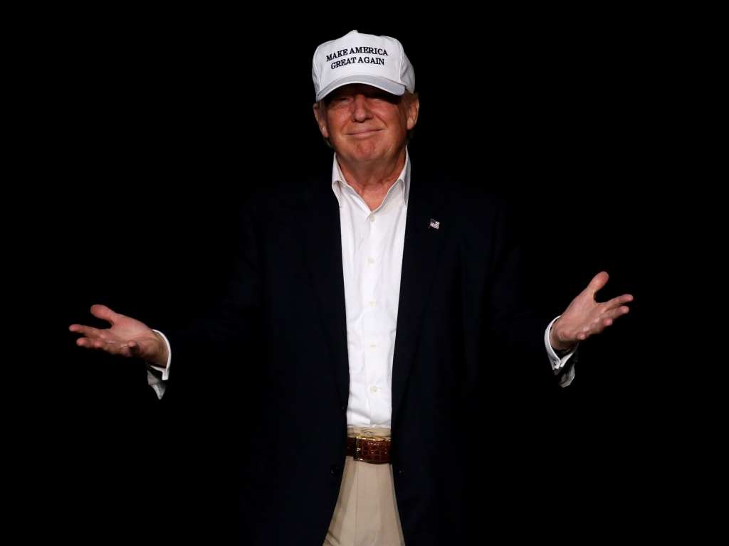 Donald Trump Republican presidential nominee Donald Trump walks on stage during a campaign event in Dimondale Michigan U.S