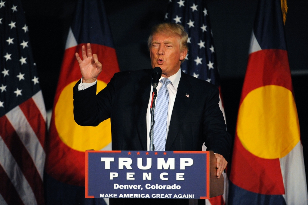 Republican President candidate Donald Trump addresses supporters at the Wings Over the Rockies Air & Space Museum