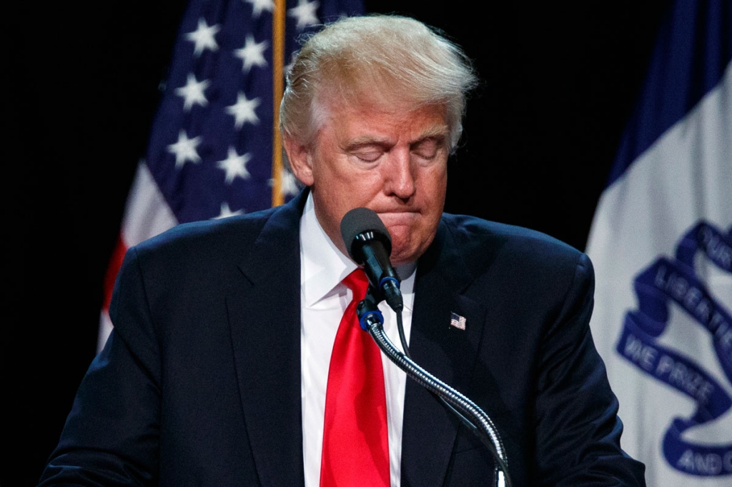 Republican presidential candidate Donald Trump pauses as he speaks during a campaign rally Friday Aug. 5 2016 in Des Moines Iowa