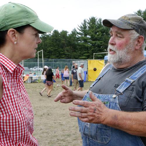 2016 Sen. Kelly Ayotte R-N.H. speaks to Dan Plourde while visiting Old Home Days in Loudon N.H. Ayotte is seeking a second term