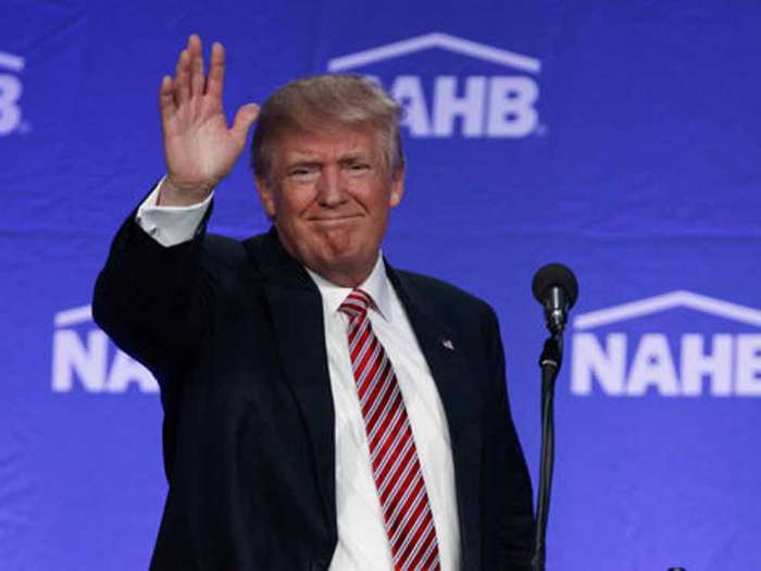 Republican presidential candidate Donald Trump waves after speaking to the National Association of Home Builders Thursday Aug. 11 2016 in Miami Beach Fla. AP