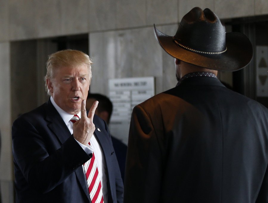 Gerald Herbert  Associated Press Republican presidential candidate Donald Trump talks with Milwaukee County Sheriff David Clarke during a campaign stop in Milwaukee Wis. where he gave a law-and-order speech Tuesday