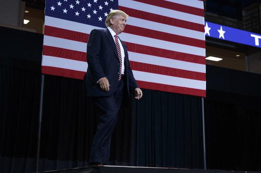 Republican presidential candidate Donald Trump arrives for a campaign rally Thursday Aug. 11 2016 in Kissimmee Fla