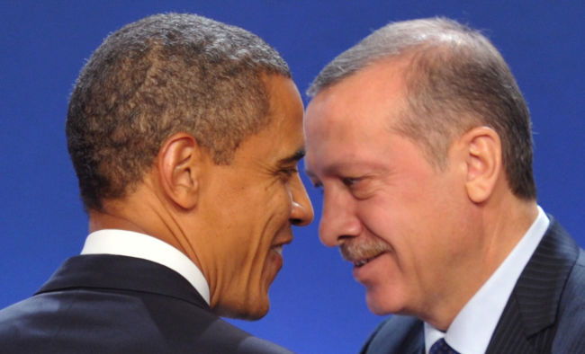 U.S. President Barack Obama and Turkey's Prime Minister Recep Tayyip Erdogan take part in a family