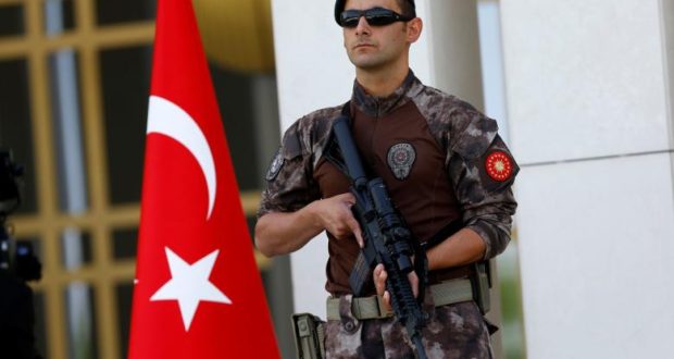 A Turkish special forces police officer guards the entrance of the Presidential Palace in Ankara