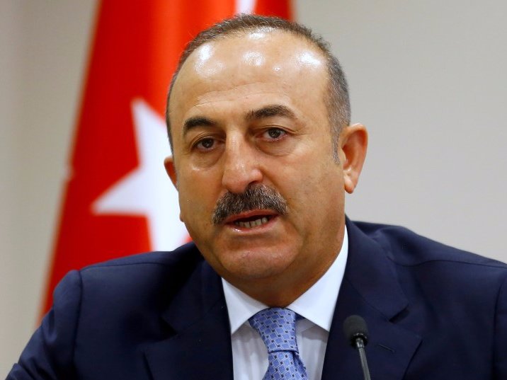 Turkey's Foreign Minister Mevlut Cavusoglu addresses the media in Ankara Turkey