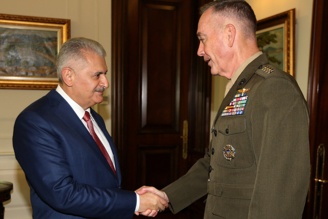 Turkey's Prime Minister Binali Yildirim left and The U.S. chairman of the Joint Chiefs of Staff Gen. Joseph Dunford