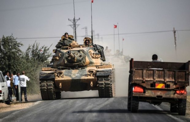 A Turkish tank heads towards the Syria border as Turkey launched operation'Euphrates Shield aimed at ridding the area of ISIS extremists