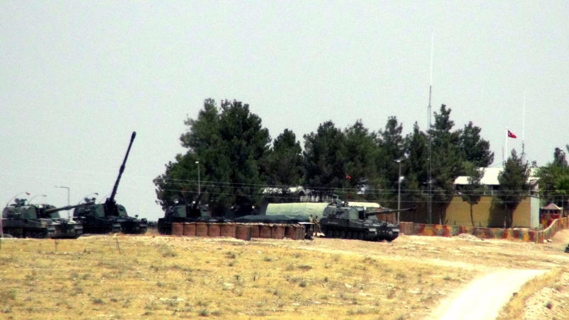 Turkish tanks sit near the Syrian border in Karkamis Turkey Wednesday Aug. 24 2016. The Obama administration is launching a fresh bid to enlist Russia as a partner in Syria despite more than a month of dashed hopes as the situation on the ground becom