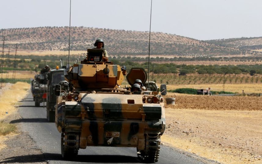 The Latest: Syria top diplomat in Iraq amid Turkey incursion