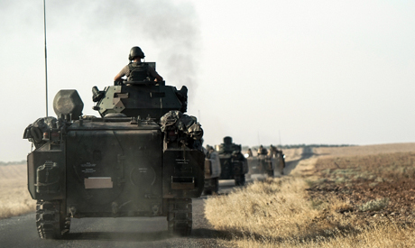 Turkish troops head to the Syrian border in Karkamis