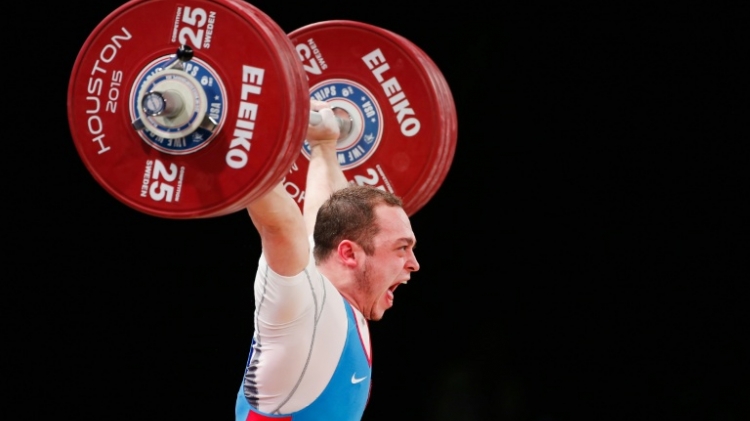 The International Weightlifting Federation has banned all eight Russian contenders- five men including Artem Okulov shown here and three women- entered for Rio