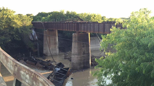 Tyler Sieswerda NBC 5 News At least five rail cars are in Denton Creek after a train derailment