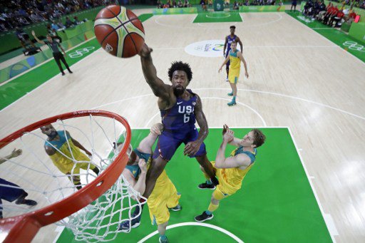 USA's centre De Andre Jordan goes for a rebound during a Men's round Group A basketball match between Australia and USA at the Carioca Arena 1 in Rio de Janeiro