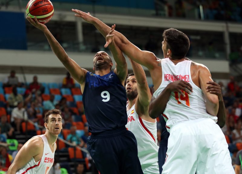 Aug 17 2016 Rio de Janeiro Brazil France guard Tony Parker shoots the ball against Spain center Guillermo Hernangomez Geuer during the men's basketball quarterfinals in the Rio 2016 Summer Olympic Games at Carioca Arena 1. This will be the