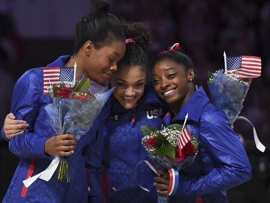 U.S. gymnasts from left Gabby Douglas Laurie Hernandez and Simone Biles