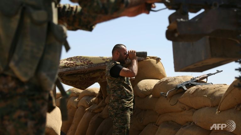 Kurdish groups capture new positions in Syrian city: official