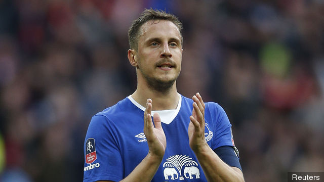 Everton's Phil Jagielka applauds the fans after the game