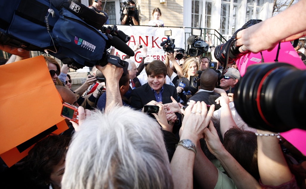 CHICAGO- MARCH 14  Disgraced former Illinois Governor Rod Blagojevich, shakes hands with supporters giving a news conference outside his home