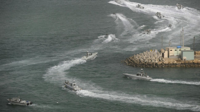 Iranian navy speed boats attend a drill in the sea of Oman. For leaders on the Iranian side of the Gulf the past days have offered some hard lessons in the politics of oil. Iran has watched as the leader