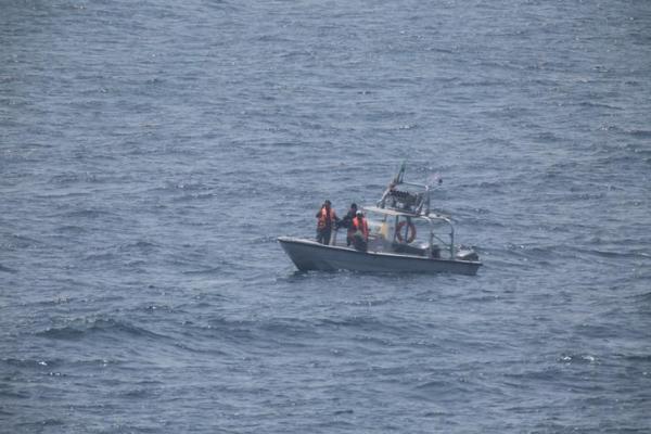 One of the five military vessels from Iran's Revolutionary Guard Corps that approached a U.S. warship hosting one of America's top generals on a day trip through the Strait of Hormuz