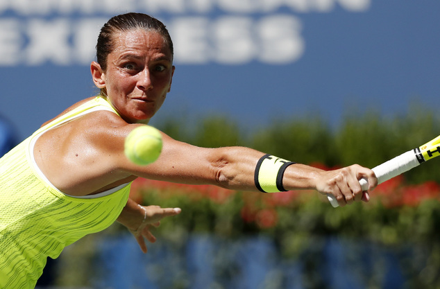 Roberta Vinci of Italy returns a shot to Anna Lena Friedsam of Germany during the first round of the US Open tennis tournament Monday Aug. 29 2016