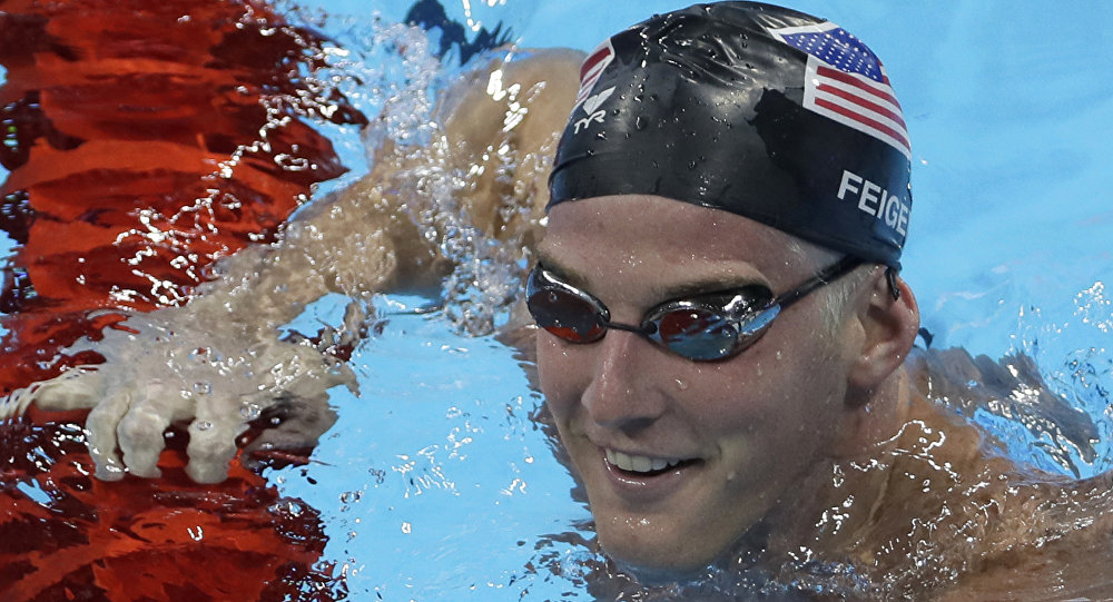 United States James Feigen smiles during a swimming training session prior to the 2016 Summer Olympics in Rio de Janeiro Brazil