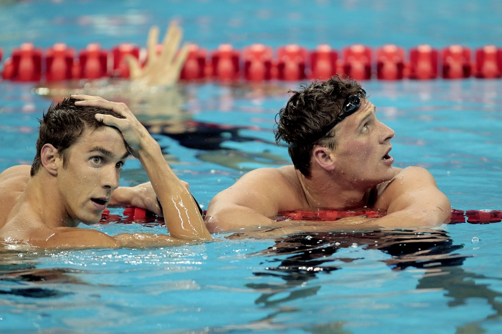 SHANGHAI CHINA- JULY 26 Silver medalist Michael Phelps of United States looks on with gold medalist Ryan Lochte after the Men's 200m Freestyle Final during Day Eleven of the 14th FINA World Championships at the Oriental Sports Center on July 2