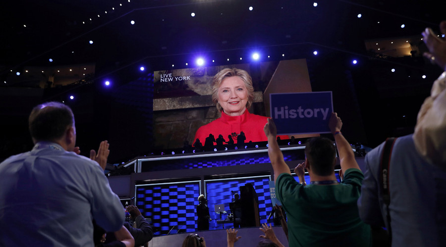 Democratic U.S. presidential nominee Hillary Clinton appears on a video monitor streamed live from New York at the Democratic National Convention in Philadelphia Pennsylvania