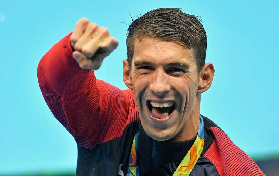 United States Michael Phelps celebrates after winning the gold medal in the men's 4x100-meter final during the swimming competitions at the 2016 Summer Olympics Monday Aug. 8 2016 in Rio de Janeiro Brazil