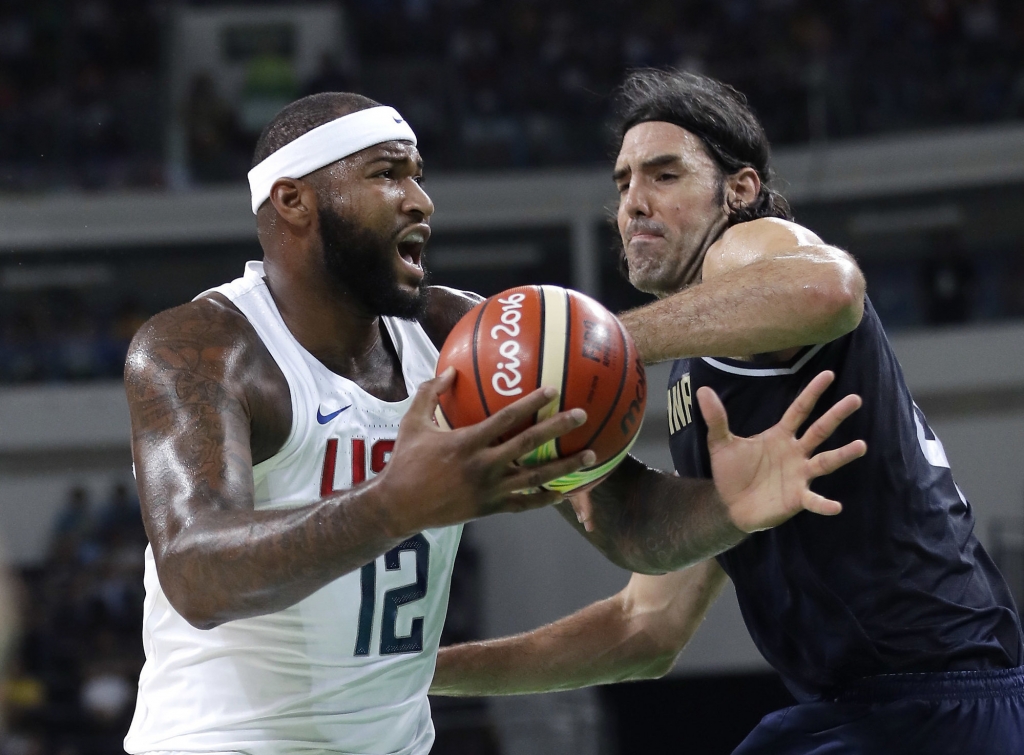 United States&apos De Marcus Cousins is pressured by Argentina's Luis Scola during a men's quarterfinal round basketball game at the 2016 Summer Olympics in Rio de Janeiro Brazil Wednesday Aug. 17 2016