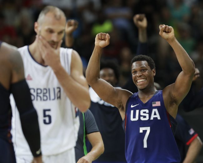 United States&#039 Kyle Lowry celebrates near Serbia's Marko Simonovic at the men's gold medal basketball game at the 2016 Summer Olympics in Rio de Janeiro Brazil Sunday Aug. 21 2016