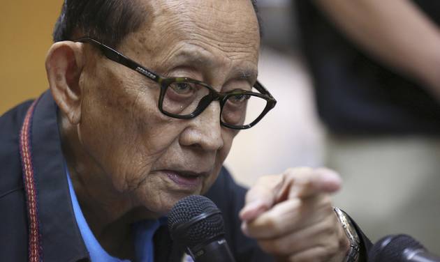 Former Philippine President Fidel Ramos gestures during a press conference before his flight at Manila's International Airport in suburban Pasay south of Manila Philippines Monday Aug. 8 2016. Ramos flew to Hong Kong on Monday for talks with lon