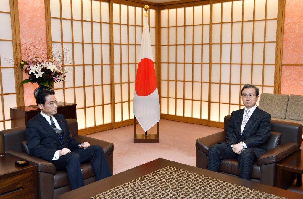 Japanese Foreign Minister Fumio Kishida left meets Chinese Ambassador to Japan Cheng Yonghua at foreign ministry in Tokyo Tuesday Aug. 9 2016. Kishida summoned China’s ambassador to his ministry lodging a protest over the increased number of Chines