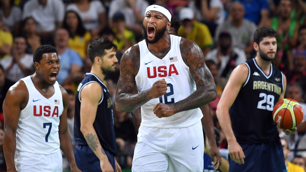 USA's centre De Marcus Cousins and USA's guard Kyle Lowry celebrate a point during a Men's quarterfinal basketball match between USA and Argentina at the Carioca Arena 1 in Rio de Janeiro