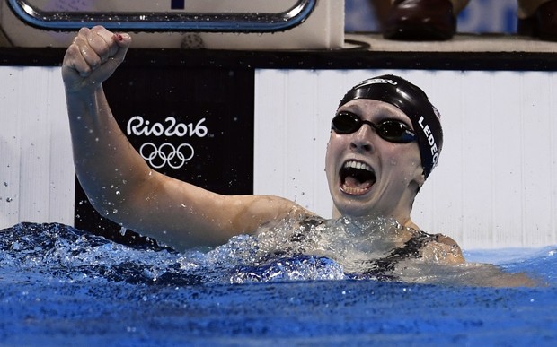 US swimmer Katie Ledecky celebrates breaking her own world record for the women's 400m freestyle at the Rio 2016 Olympic Games on 8 August 2016