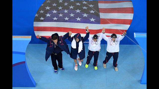 RIO DE JANEIRO BRAZIL- AUGUST 13 Nathan Adrian Ryan Murphy Michael Phelps and Cody Miller of the United States are greeted to the crowd before the Men's 4 x 100m Medley Relay Final on Day 8 of the Rio 2016 Olympic Games at the Olympic Aquatics Stadiu