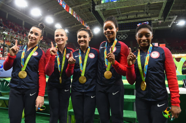 Gold medalists Alexandra Raisman Madison Kocian Lauren Hernandez Gabrielle Douglas and Simone Biles of the United States pose for