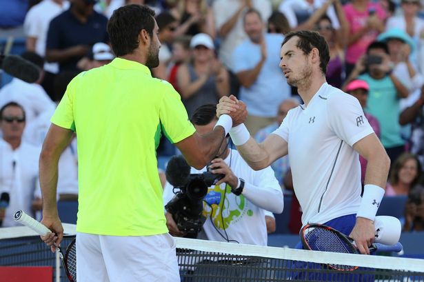 Marin Cilic and Andy Murray shake hands at the end of the final of the Cincinnati Masters